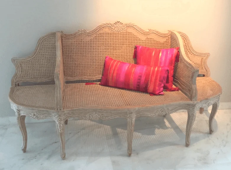 Handcrafted cane sofa with bespoke furnishings by Art Livings